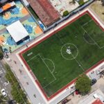 Vista aérea de una unidad deportiva rehabilitada en Guadalajara como parte de obras en espacios públicos e infraestructura deportiva.