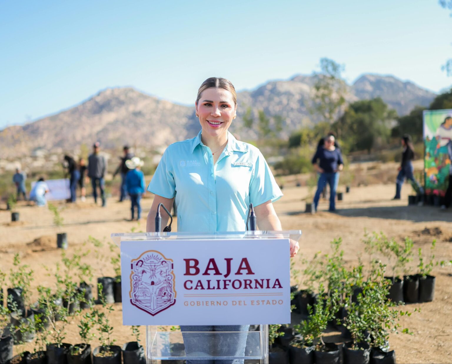 Marina del Pilar Avila Olmeda encabeza una jornada de reforestación en el Ejido Juntas de Nejí, en Tecate.